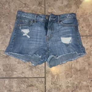 Distressed denim shorts